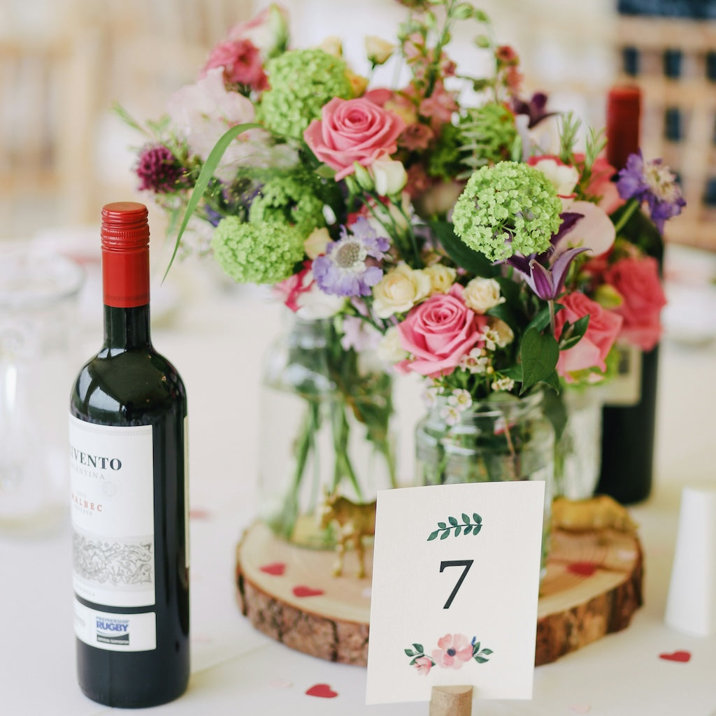 Bottle of wine on table at wedding. 